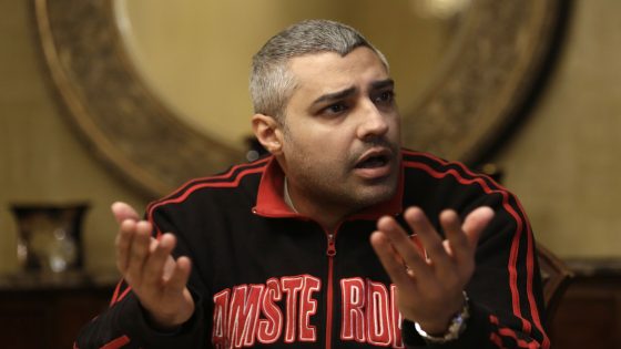 Canadian Al-Jazeera English journalist Mohamed Fahmy, speaks during an interview with The Associated Press in Cairo, Egypt, Thursday, Feb. 19, 2015. Al-Jazeera journalists Fahmy and Baher Mohammed are free pending their retrial, scheduled for Feb. 23. A third colleague, Peter Greste, was released two weeks ago and deported to his home country of Australia. (AP Photo/Hassan Ammar)